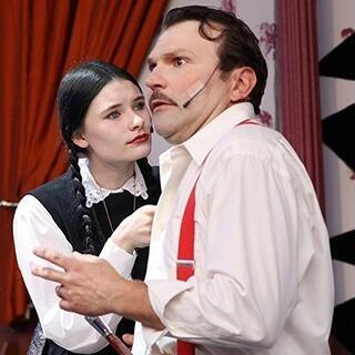 A male and a female actor performing a scene